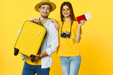 couple painting wall with paint roller