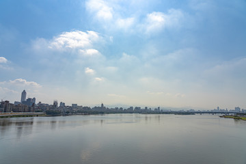 Scenery of Tamsui river bank, view on Taipei bridge, a bridge link New Taipei City to Taipei city, Taiwan