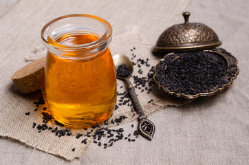 Glass jar with oil.