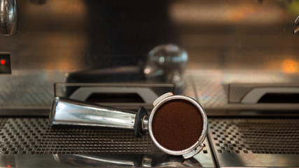 Coffee powder on coffee tamper