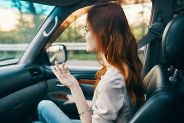 young woman in car