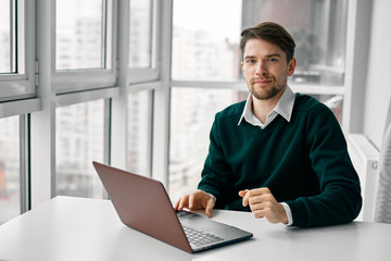 businessman working on laptop in office