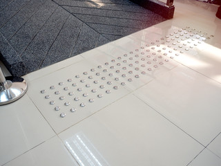 Metallic dot tactile floor, blind path for blind people.