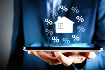 businessman and percent icon with home