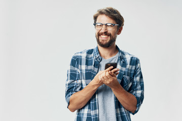 portrait of young man with mobile phone