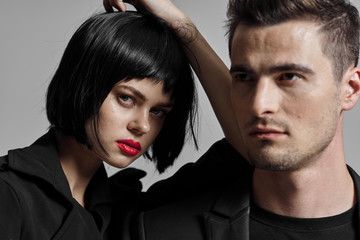 portrait of young man and woman