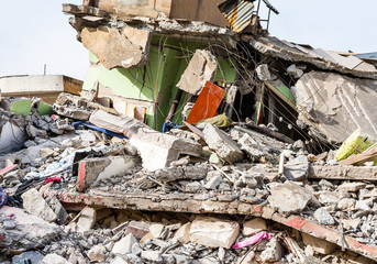 Destroyed slum- pile of garbage