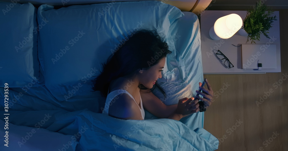 Sticker woman use smartphone on bed