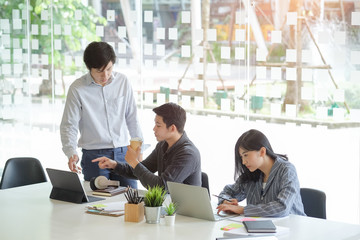 Business working in office with documents and laptop people Consulting and business planning.