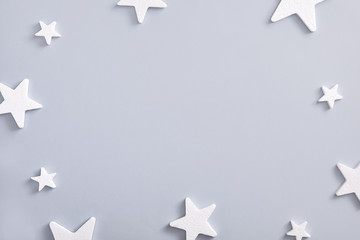 White star over pastel blue background