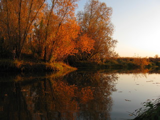 beautiful landscape with autumn sunset and clouds