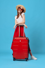 girl in a dress with suitcase