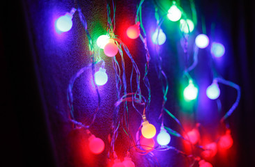 Christmas lights over dark blue background