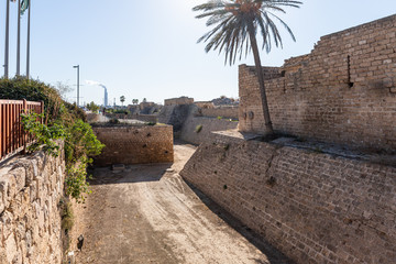 Remains of the outer walls of Caesarea Fortress on the Mediterranean coast near Caesarea city in...