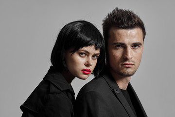 portrait of young man and woman