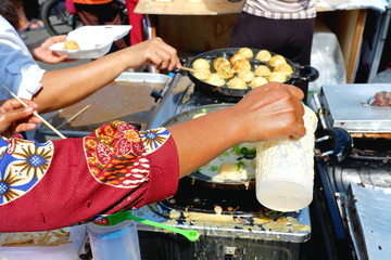 The people get on ships in the middle of the sea.