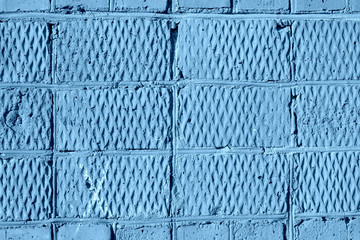 Old brick texture close up. Abstract architectural background blue color toned