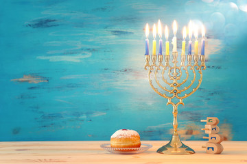 religion image of jewish holiday Hanukkah background with menorah (traditional candelabra),...