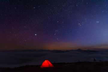 Fairytale landscapes of the winter Carpathian Mountains with a charming milky way in the sky...