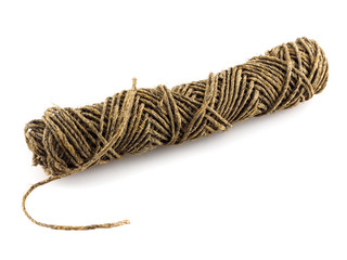 Roll of twine on white background. Strong brown rope