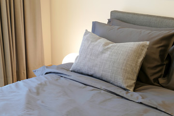 Fototapeta na wymiar soft pillows on the comfortable bed