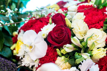 The arrangement of bunch of decorative  flowers