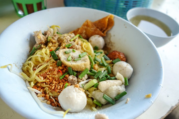 Egg Noodles with fish ball topped with spring oion -Thai-Chinese street food