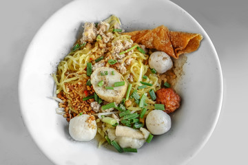 Egg Noodles with fish ball topped with spring oion -Thai-Chinese street food