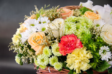 Beautiful colorful flowers in basket