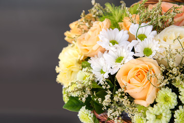 Beautiful colorful flowers in basket