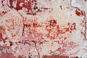 Texture of a concrete wall with cracks and scratches which can be used as a background