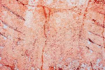 Texture of a concrete wall with cracks and scratches which can be used as a background