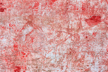 Texture of a concrete wall with cracks and scratches which can be used as a background