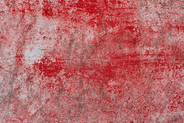 Texture of a concrete wall with cracks and scratches which can be used as a background