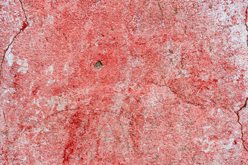 Texture of a concrete wall with cracks and scratches which can be used as a background