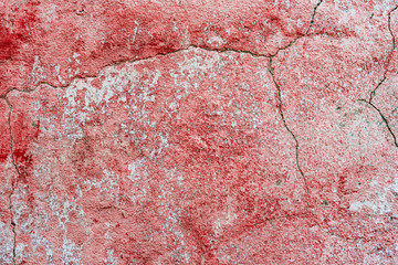 Texture of a concrete wall with cracks and scratches which can be used as a background