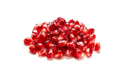 Bunch of separated ripe pomegranate seeds isolated on white background.