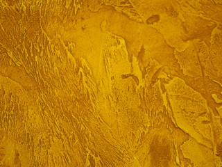 surface of the wall is rough, paint in gold texture material background