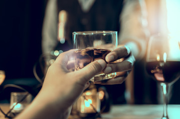 Cheers clinking of friends in party	