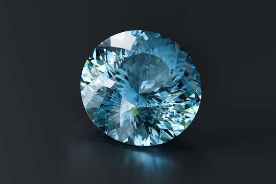 Bir round portuguese cut blue topaz on black background.