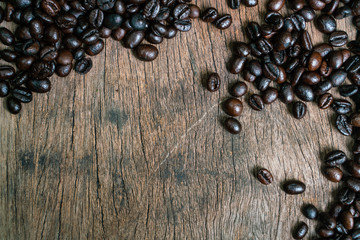 Roasted coffee bean flat lay on wood background