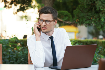 businessman talking on mobile phone