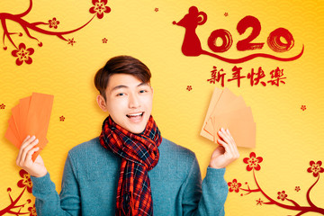 asian young  man celebrating for chinese new year. chinese text happy new year 2020