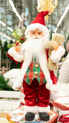 Christmas toy Santa Claus in red clothes