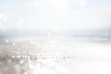 Obraz premium abstract background of glitter vintage lights . silver, gold and white. de-focused