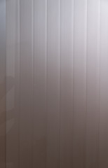 Seamless corrugated zinc sheet facade in gray color / architecture / seamless pattern / wallpaper concept / metal texture