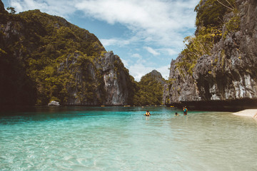 Philippines , El Nido palawan island , small lagoon with blue water and rocks around wide angle shot.