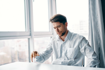 portrait of a businessman working in his office