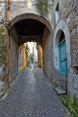 Fototapeta na wymiar Teano, Italy, 11/30/2019. A street among the old houses of a medieval village