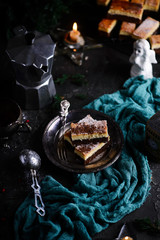 Polish cheesecake on the dark Christmas background.